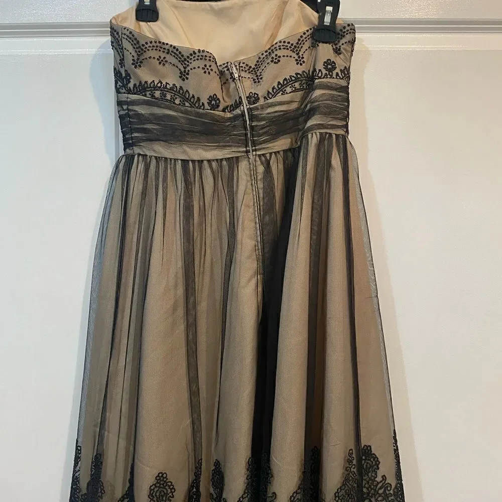 David’s bridal strapless dress with bead detail and sparkle. Worn once. EUC